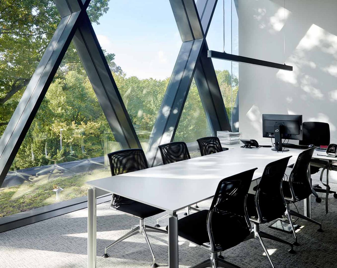 meeting room with glass window front in Immogra office